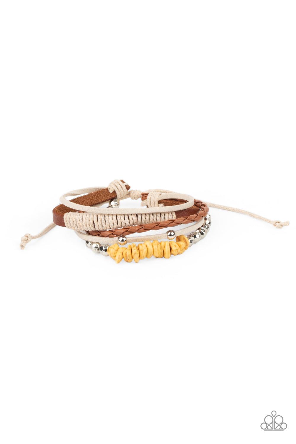 Paparazzi Accessories Keep At ROAM Temperature - Yellow A strand of yellow pebbles and faceted silver beads joins rustic suede and leather bands around the wrist, creating earthy layers. Features an adjustable sliding knot closure. Sold as one individual