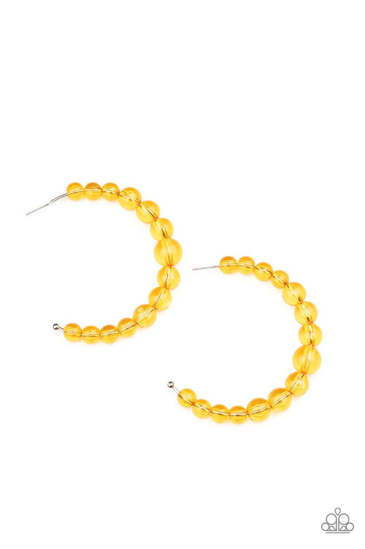 Paparazzi Accessories In The Clear - Orange Gradually increasing in size at the center, a glassy collection of Marigold beads are threaded along an oversized hoop for a bubbly effect. Earring attaches to a stand post fitting. Hoop measures approximately 2