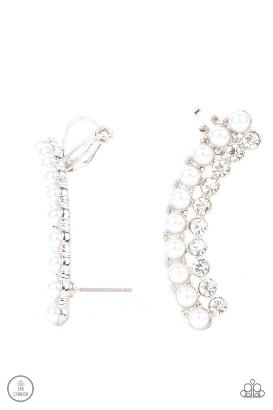 Paparazzi Accessories Doubled Down On Dazzle - White Featuring classic silver fittings, two rows of dainty white pearls and glassy white rhinestones arch into a timeless statement piece. Earring attaches to a standard post earring. Features a clip-on fitt