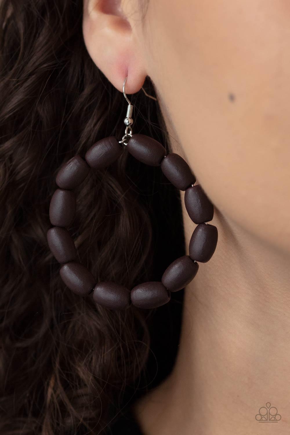 Paparazzi Accessories Living The WOOD Life - Brown Chunky brown wooden beads are threaded along a dainty wire, creating an earthy hoop. Earring attaches to a standard fishhook fitting. Sold as one pair of earrings. Jewelry