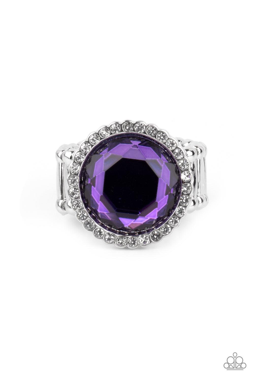 Paparazzi Accessories Crown Culture - Purple A round purple gem is bordered in a glassy ring of dainty white rhinestones, creating a sparkly centerpiece atop the finger. Features a stretchy band for a flexible fit. Sold as one individual ring. Jewelry