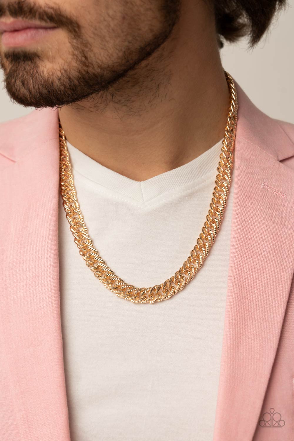 Paparazzi Accessories Urban Uppercut - Gold Etched in linear textures, an oversized gold chain drapes below the collar for a dramatic industrial effect. Features an adjustable clasp closure. Sold as one individual necklace. Get The Complete Look! Bracelet