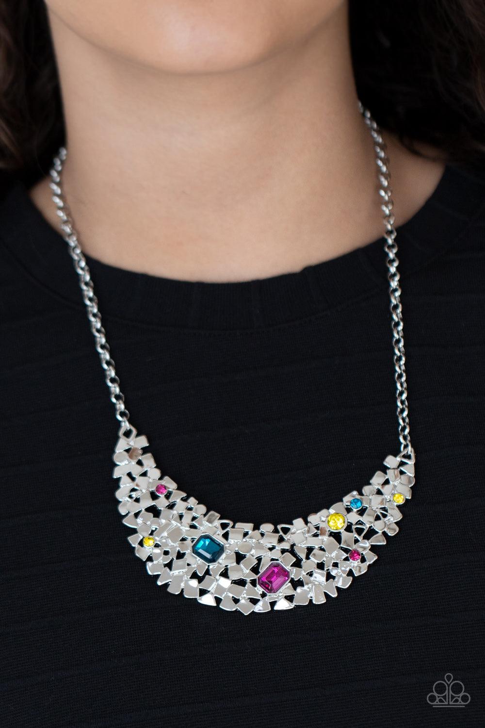 Paparazzi Accessories Fabulously Fragmented - Multi Sporadically dotted in mismatched multicolored rhinestones, a smattering of fragmented silver frames coalesce into a bold half moon below the collar for an edgy fashion. Features an adjustable clasp clos