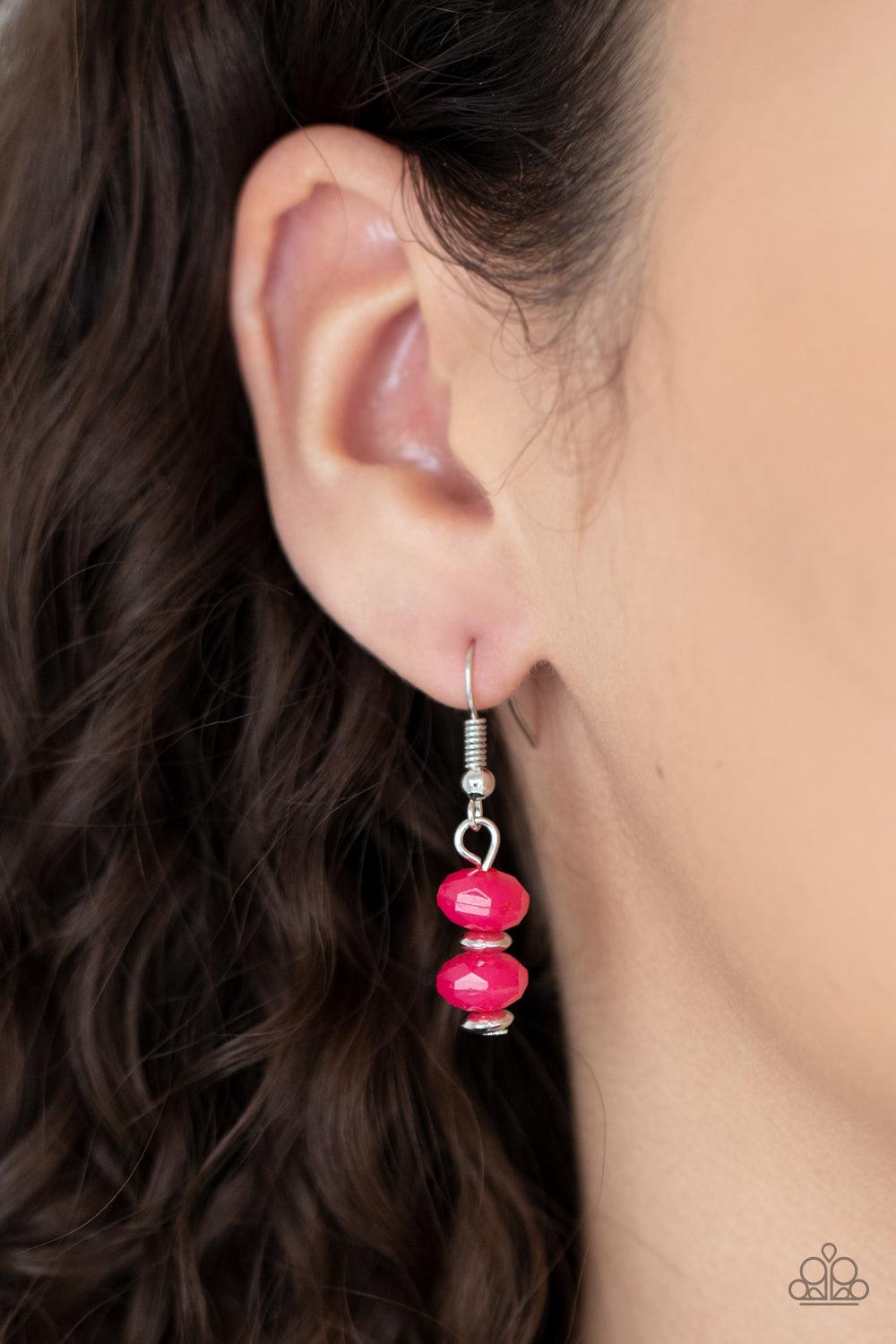 Paparazzi Accessories Best POSH-ible Taste - Pink Featuring bold silver fittings, a whimsical collection of faceted pink opaque crystal-like beads and dainty silver beads are threaded along invisible wires below the collar, creating vivacious layers. Feat