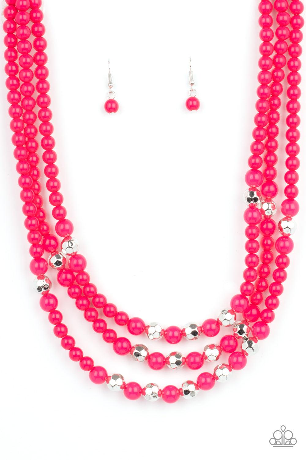 Paparazzi Accessories STAYCATION All I Ever Wanted - Pink A colorful collection of polished pink beads, faceted silver beads, and opaque pink beads are threaded along invisible wires across the chest, creating vivacious layers. Features an adjustable clas
