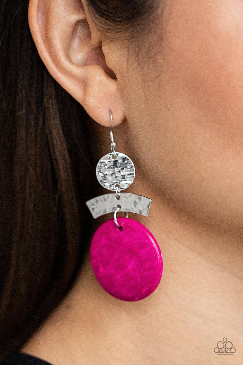 Paparazzi Accessories Diva Of My Domain - Pink Featuring a distressed pink finish, a wooden disc swings from the bottom of a hammered curved plate and hammered silver disc, coalescing into an earthy lure. Earring attaches to a standard fishhook fitting. S