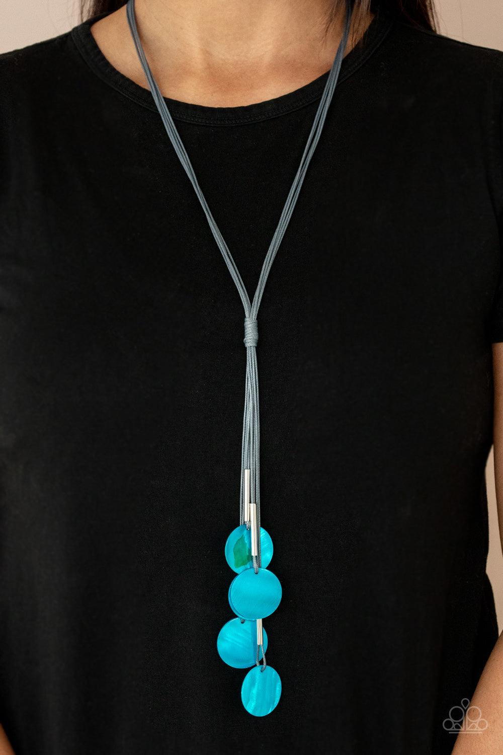 Paparazzi Accessories Tidal Tassels - Blue Featuring cylindrical silver accents, iridescent blue shell-like discs swing from the ends of knotted Ultimate Gray cords, creating a colorful tassel. Features an adjustable sliding knot closure. Sold as one indi