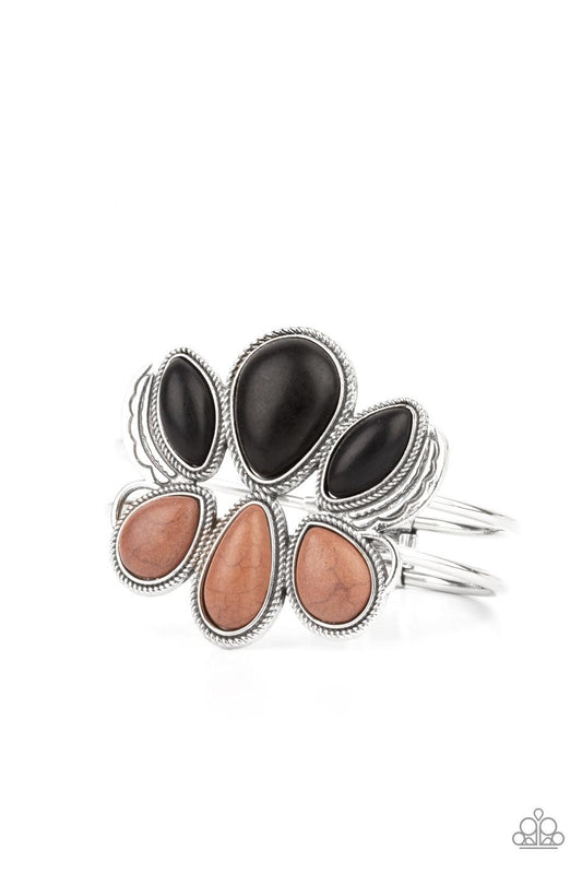 Paparazzi Accessories Botanical Badlands - Multi Encased in antiqued silver rope-like frames, a colorful collection of black and brown stone teardrops stack into a rustic centerpiece atop a layered silver cuff. Features an adjustable hinged closure. Sold