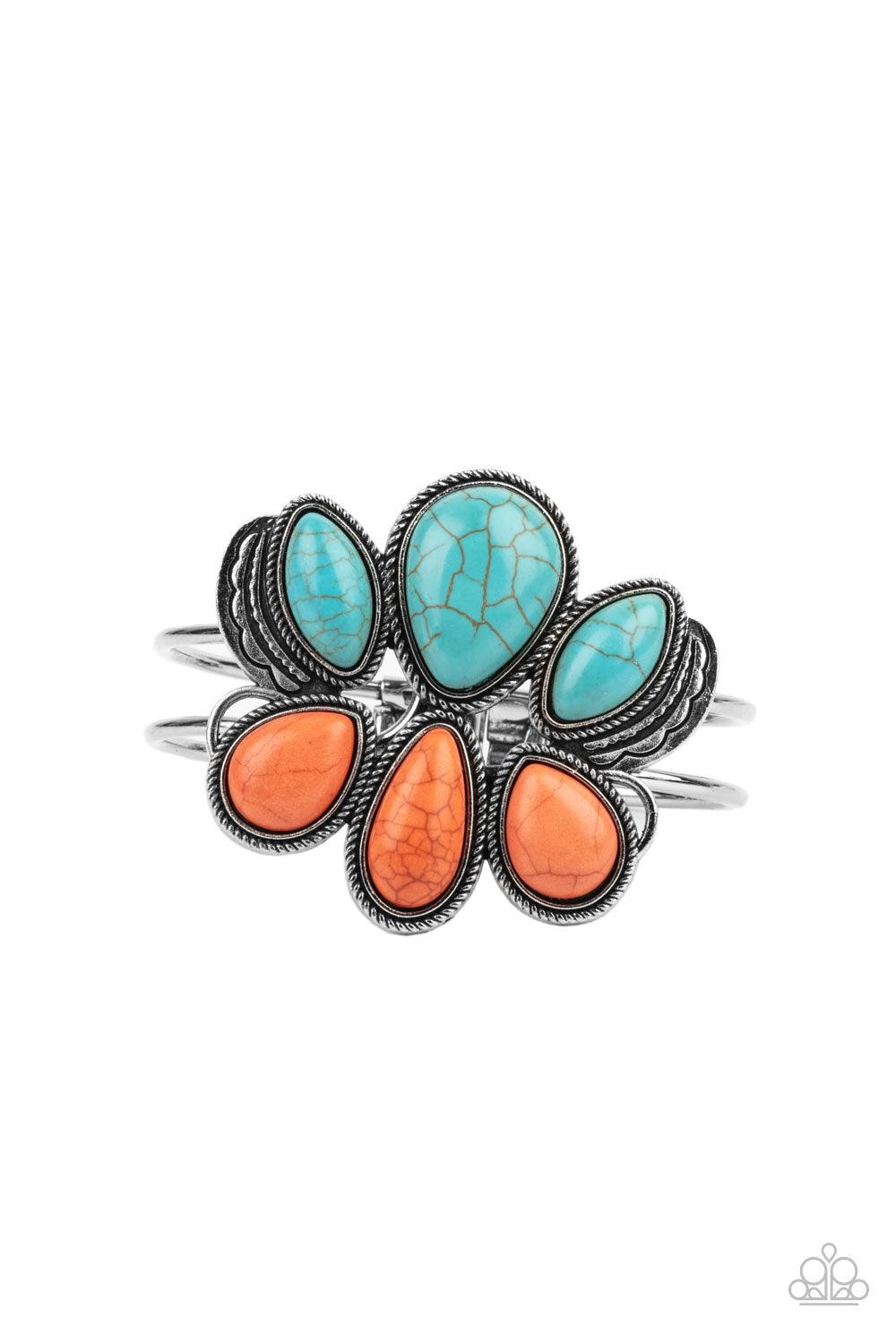 Paparazzi Accessories Botanical Badlands - Orange Encased in antiqued silver rope-like frames, a colorful collection of turquoise and orange stone teardrops stack into a rustic centerpiece atop a layered silver cuff. Features an adjustable hinged closure.