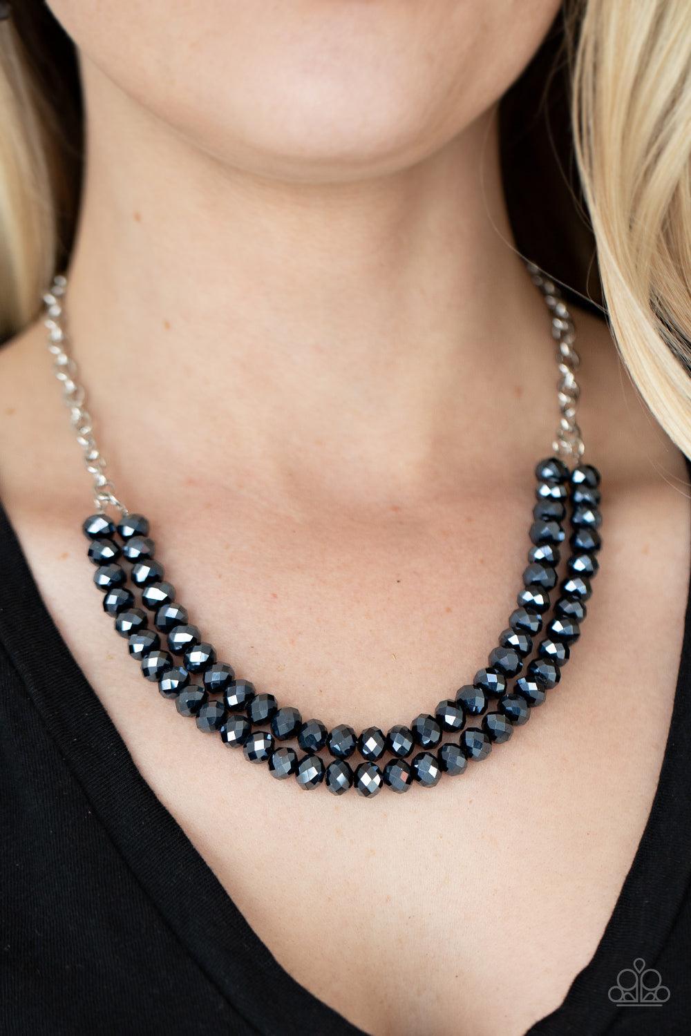 Paparazzi Accessories May The FIERCE Be With You - Blue A sturdy silver chain connects double strands of Inkwell beads. The reflective multi-faceted beads connect below the collar for a fiercely stunning style. Features an adjustable clasp closure. Sold a