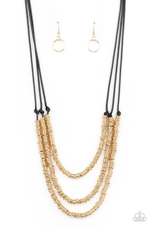 Paparazzi Accessories RING to Reason - Gold A seemingly infinite collection of dainty gold rings are knotted in place along three black cords, creating edgy layers across the chest. Features an adjustable clasp closure. Sold as one individual necklace. In