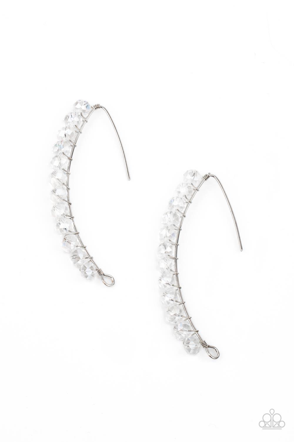 Paparazzi Accessories GLOW Hanging Fruit - White A glittery collection of iridescent white rhinestones are fitted in place along a curved silver wire, creating a glamorous hanging post. Earring attaches to a standard hanging post fitting. Sold as one pair