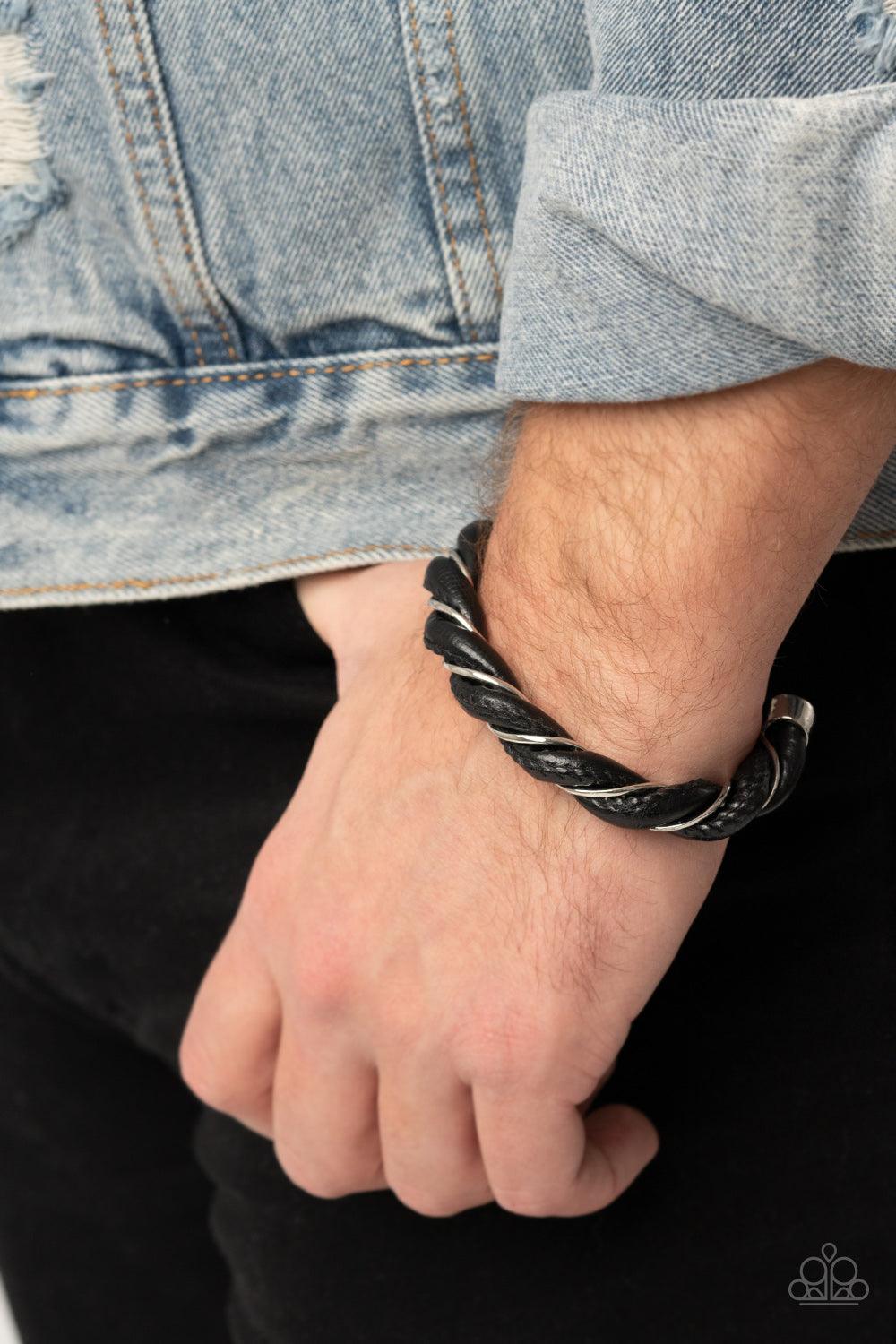 Paparazzi Accessories Rebel Relic - Black Capped in bold silver fittings, a dainty silver wire and a black leathery cord spin into an edgy cuff around the wrist. Sold as one individual bracelet. Jewelry