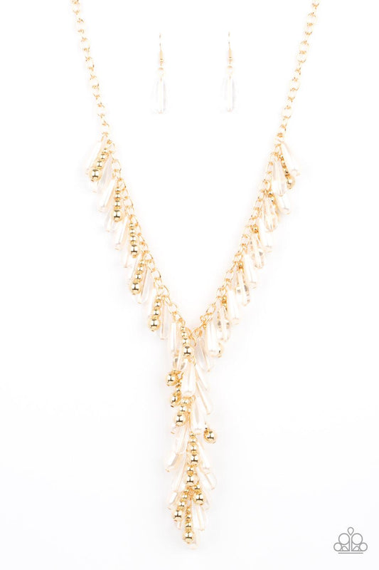 Paparazzi Accessories Dripping With DIVA-ttitude - Gold Glassy, pearly, and gold beaded teardrops elegantly drip along a classic gold chain across the chest. Matching beads cascade from an extended tassel, creating a glamorously clustered pendant. Feature