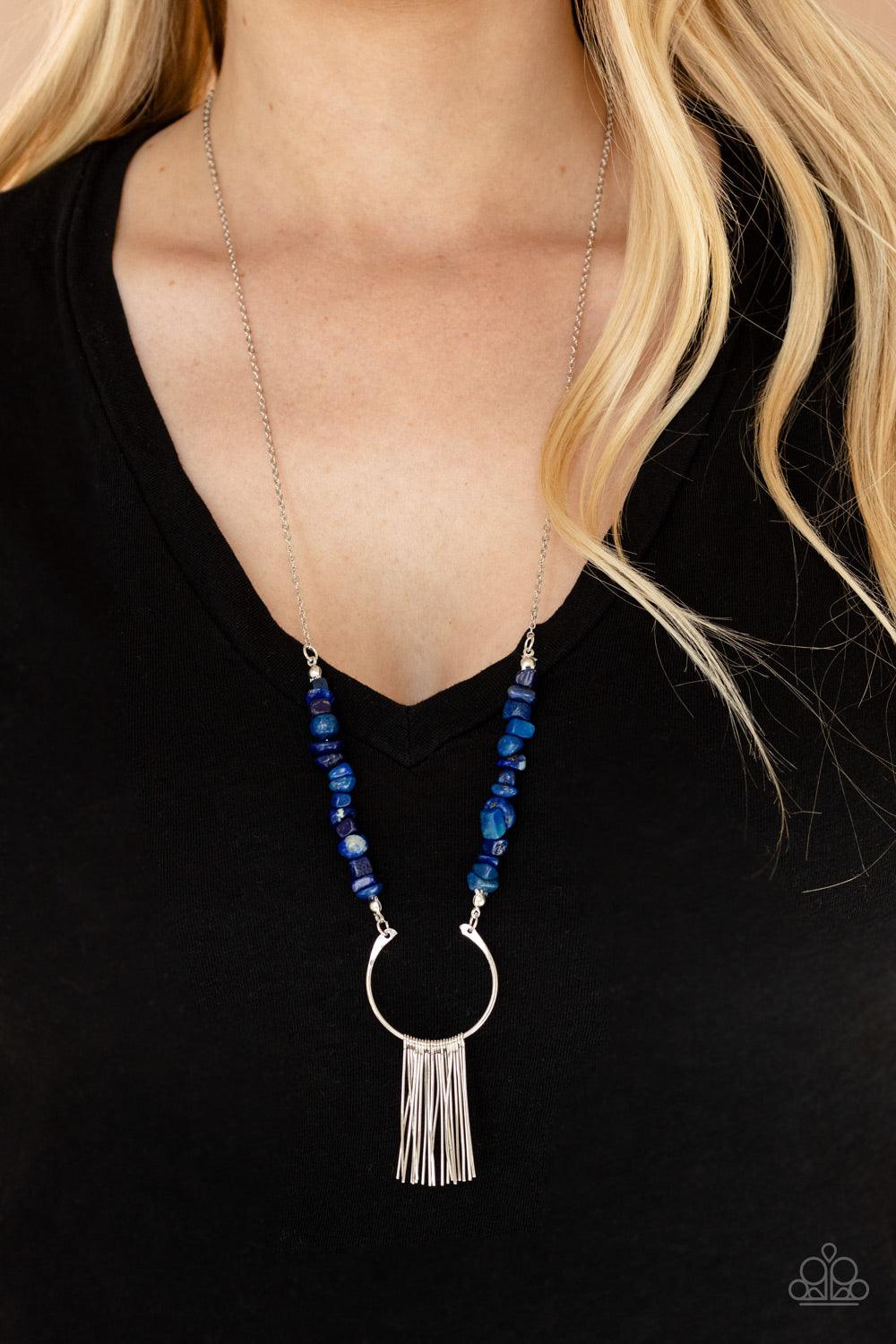 Paparazzi Accessories With Your ART and Soul - Blue Dainty silver rods swing from the bottom of a bowing silver fitting that attaches to sections of lapis pebbles at the bottom of a silver chain, creating a whimsically seasonal display. Features an adjust