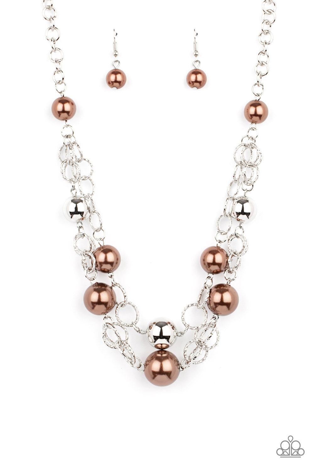 Paparazzi Accessories New Age Knockout - Brown Sections of oversized textured silver links, brown pearls, and shiny silver beads haphazardly connect into two timeless layers below the collar, creating a dramatically refined display. Features an adjustable