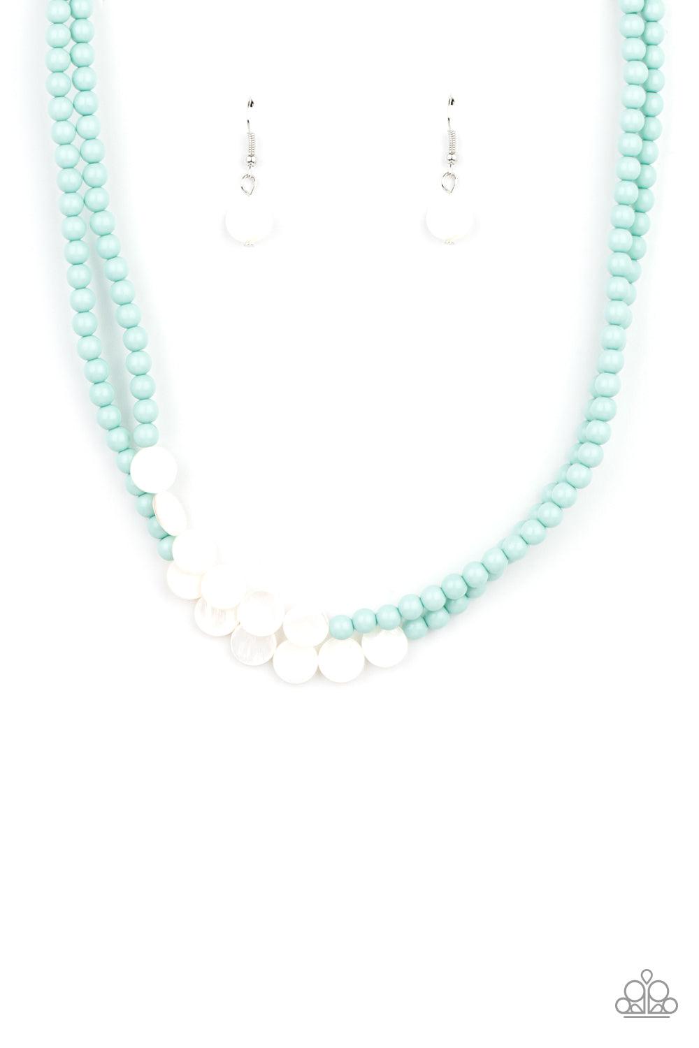 Paparazzi Accessories Extended STAYCATION - Blue A summery collection of shiny white shell-like discs and dainty blue beads are threaded along invisible wire, creating colorful layers below the collar. Features an adjustable clasp closure. Sold as one ind