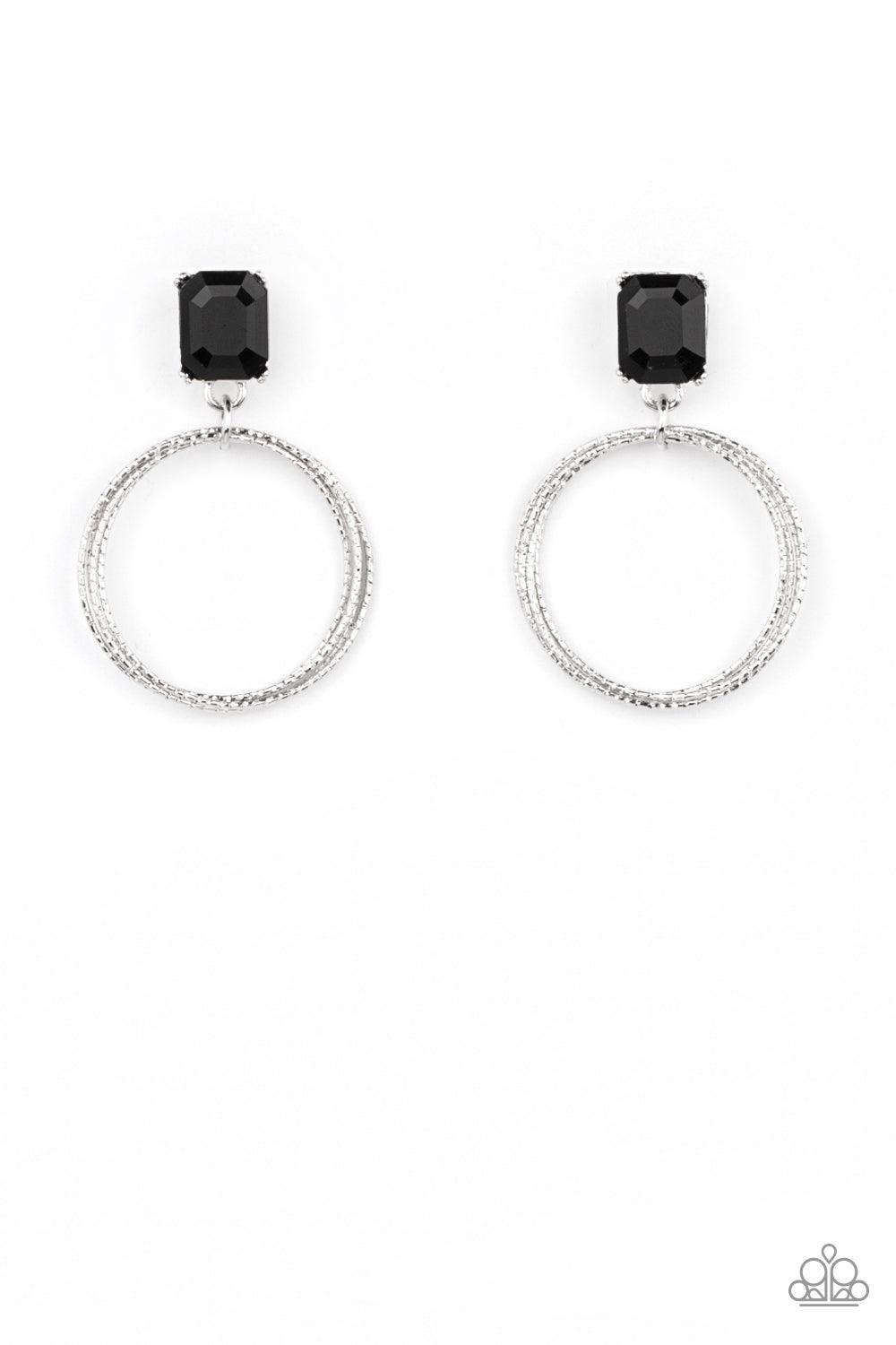 Paparazzi Accessories Prismatic Perfection - Black Encased in a pronged silver setting, a black emerald cut rhinestone links with a trio of textured silver rings, creating a romantic lure. Earring attaches to a standard post fitting. Sold as one pair of p