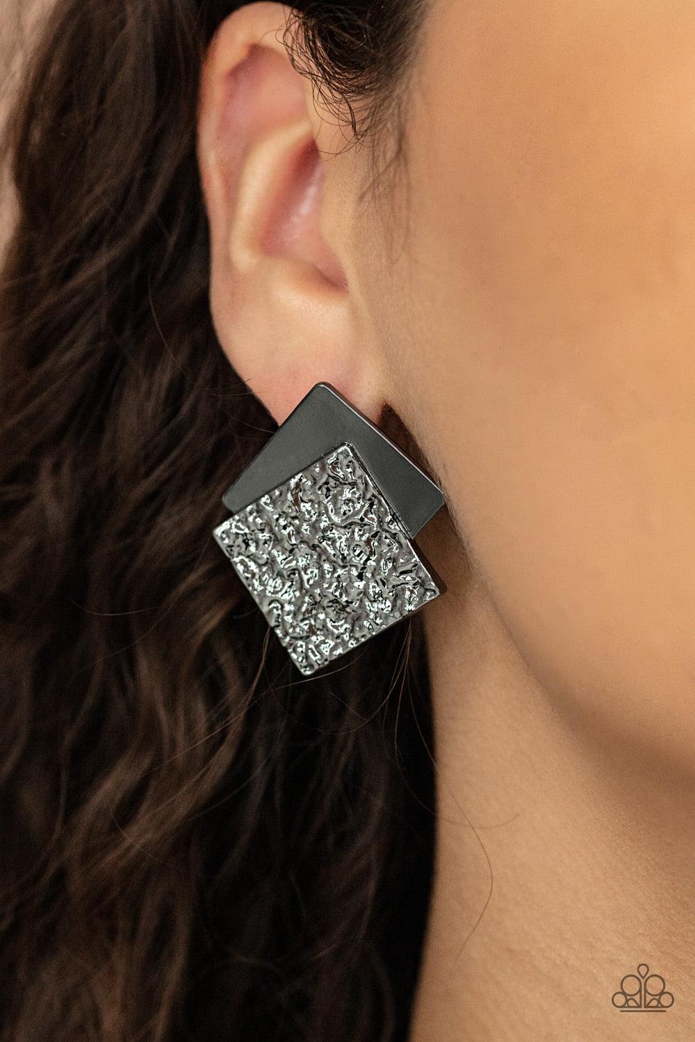 Paparazzi Accessories Square With Style - Black Embossed in gritty textures, a rough gunmetal square overlaps a plain gunmetal square, creating a stacked frame. Earring attaches to a standard post fitting. Sold as one pair of post earrings. Jewelry