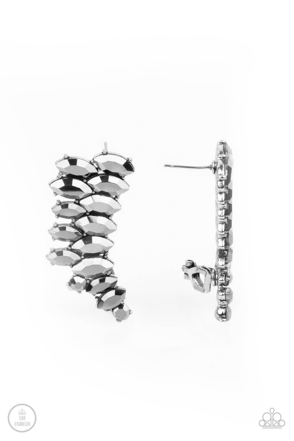 Paparazzi Accessories Explosive Elegance - Silver An explosion of marquise-cut hematite rhinestones delicately climb the ear, coalescing into a smoldering frame. Earring attaches to a standard post fitting. Features a clip-on fitting at the top for a secu