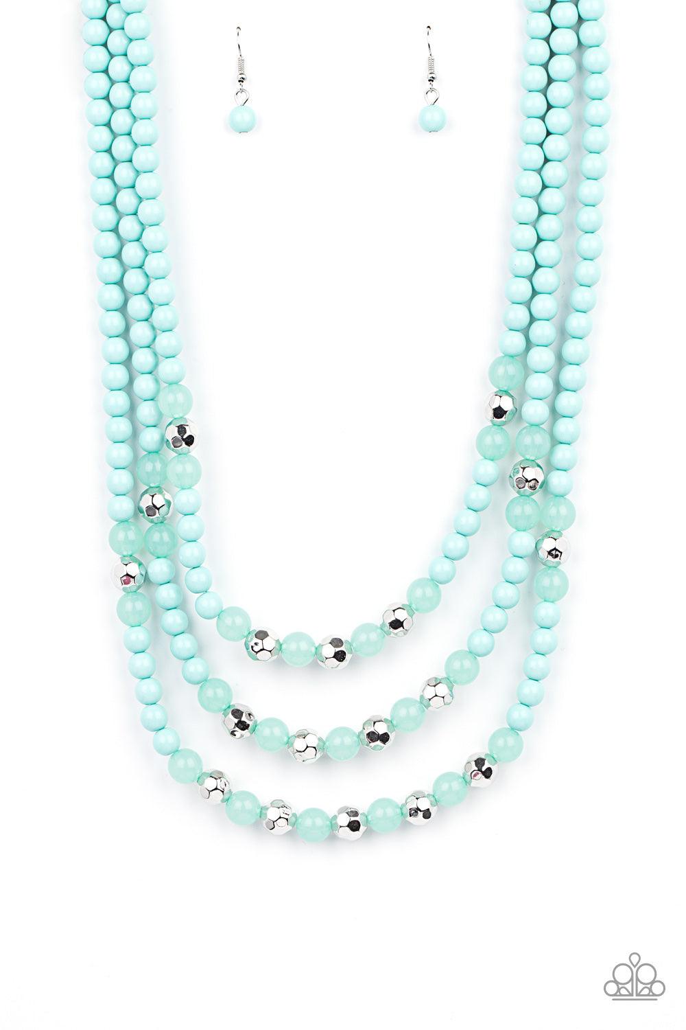 Paparazzi Accessories STAYCATION All I Ever Wanted - Blue A colorful collection of polished and opaque Blue Radiance beads and faceted shiny silver beads are threaded along invisible wires across the chest, creating vivacious layers. Features an adjustabl