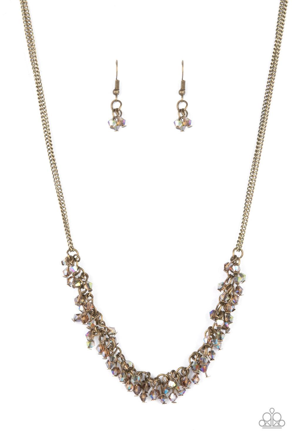 Paparazzi Accessories Let There Be TWILIGHT - Brass Dainty brassy tone-on-tone iridescent beads swing from doubled brass chains, creating a clustered fringe below the collar. Features an adjustable clasp closure. Sold as one individual necklace. Includes