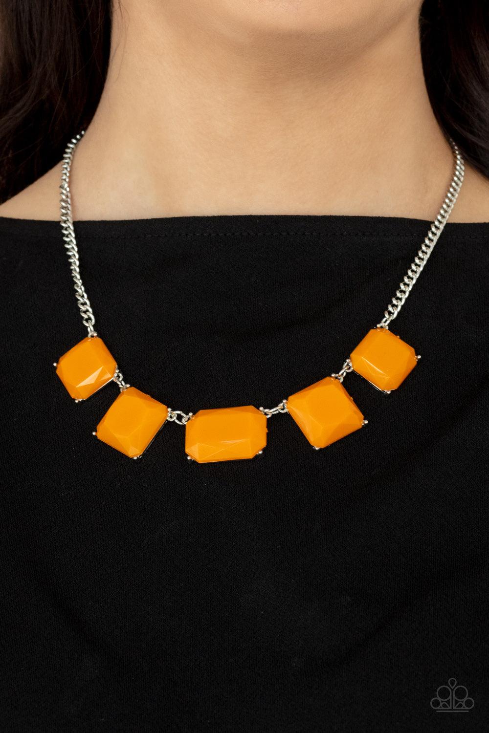 Paparazzi Accessories Instant Mood Booster - Orange Varying in shape, faceted Marigold acrylic frames delicately link below the collar, creating a vivacious display. Features an adjustable clasp closure. Sold as one individual necklace. Includes one pair