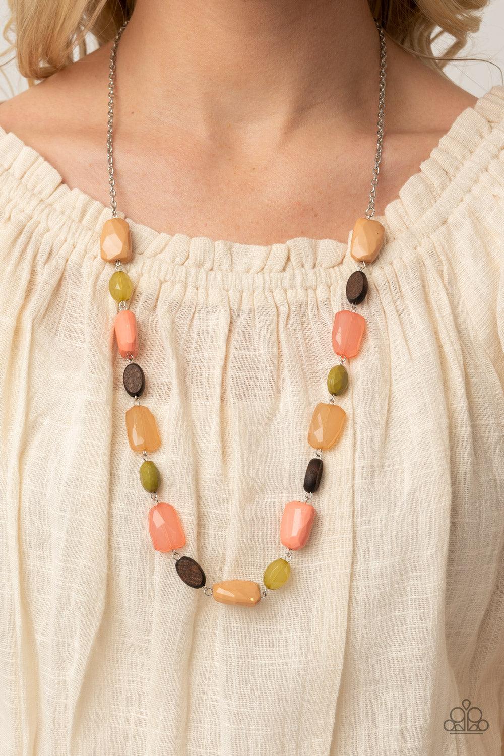 Paparazzi Accessories Meadow Escape - Multi Varying in opacity, a mixed assortment of faceted Willow, Burnt Coral, and Desert Mist beads delicately link with dainty wooden beads across the chest, creating a whimsically earthy display. Features an adjustab