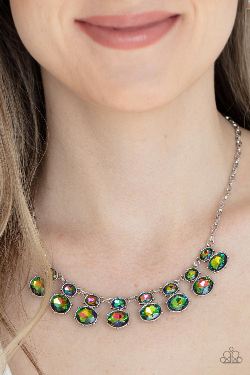 Paparazzi Accessories Cosmic Countess - Multi Double stacks of iridescent multi-colored oval cut gems link elegantly across the collar on a silver chain for a deliriously cosmic flair of glamour. Features an adjustable clasp closure. Sold as one individua