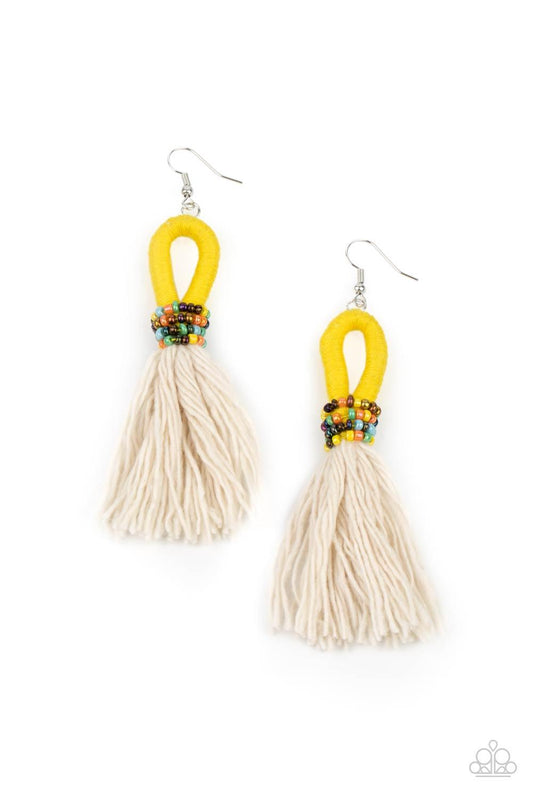 Paparazzi Accessories The Dustup - Yellow A tassel of soft white cotton fans out under rows of brightly colored seed beads. Anchored by a loop of vibrant yellow floss, the eye-catching style swings from the ear for a show-stopping statement. Earring attac