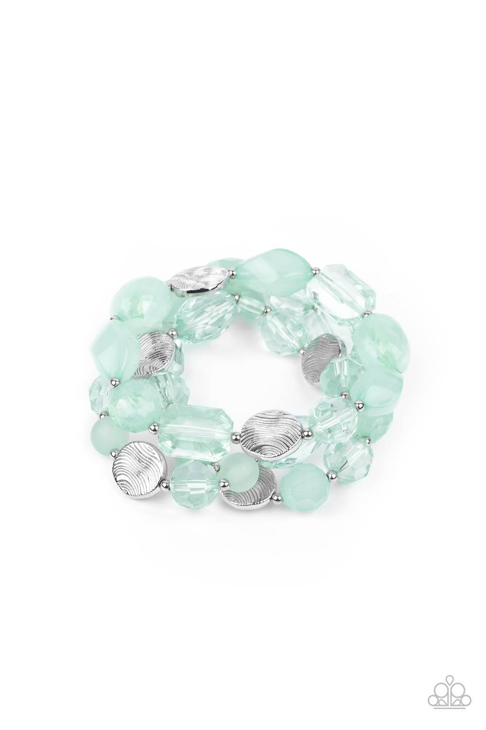 Paparazzi Accessories Oceanside Bliss - Green Glassy and opaque Green Ash crystal-like beads and textured silver accents are threaded along stretchy bands around the wrist, creating mystical layers. Sold as one set of three bracelets. Jewelry