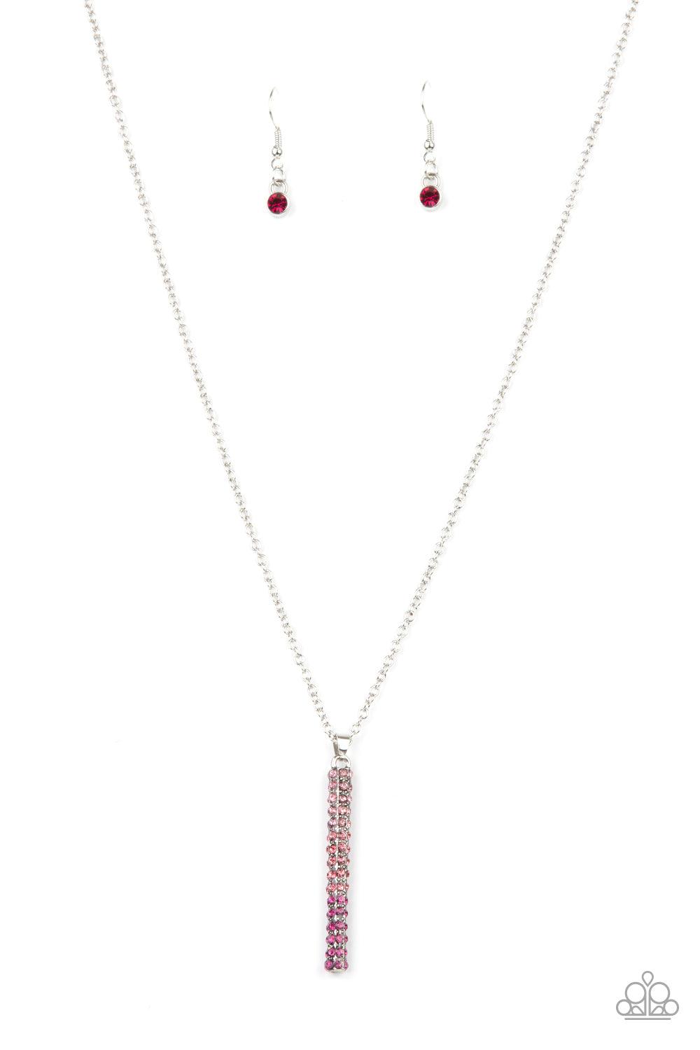 Paparazzi Accessories Tower Of Transcendence - Pink A sparkly collection of spectrum pink rhinestones are encrusted along a silver pendulum that swings along the bottom of a silver chain, creating a glittery ombre effect. Features an adjustable clasp clos