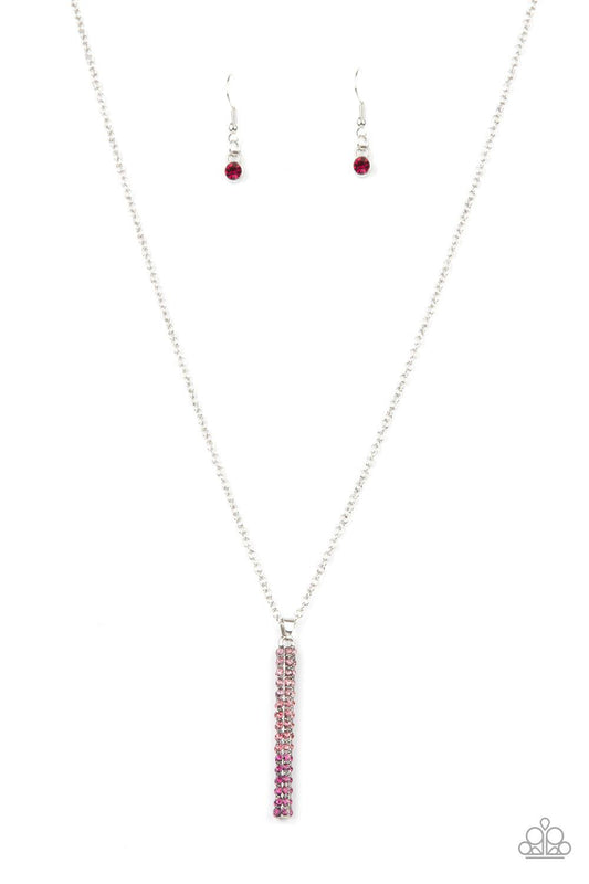 Paparazzi Accessories Tower Of Transcendence - Pink A sparkly collection of spectrum pink rhinestones are encrusted along a silver pendulum that swings along the bottom of a silver chain, creating a glittery ombre effect. Features an adjustable clasp clos
