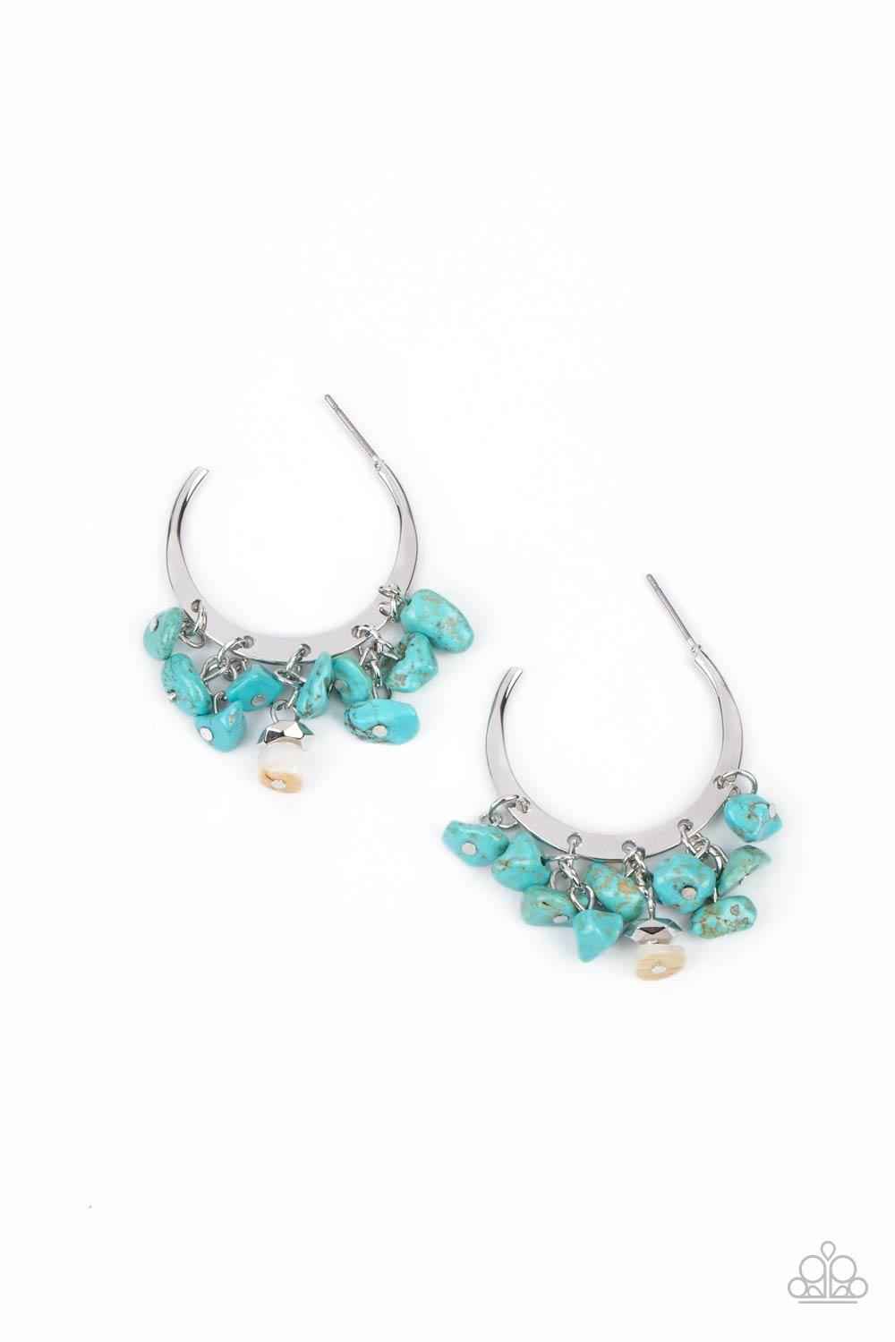 Paparazzi Accessories Gorgeously Grounding - Blue Clusters of turquoise pebbles swing from the bottom of a dainty silver hoop, creating an earthy fringe. A faceted silver and white stone bead swings from the center, adding an ethereal edge. Earring attach