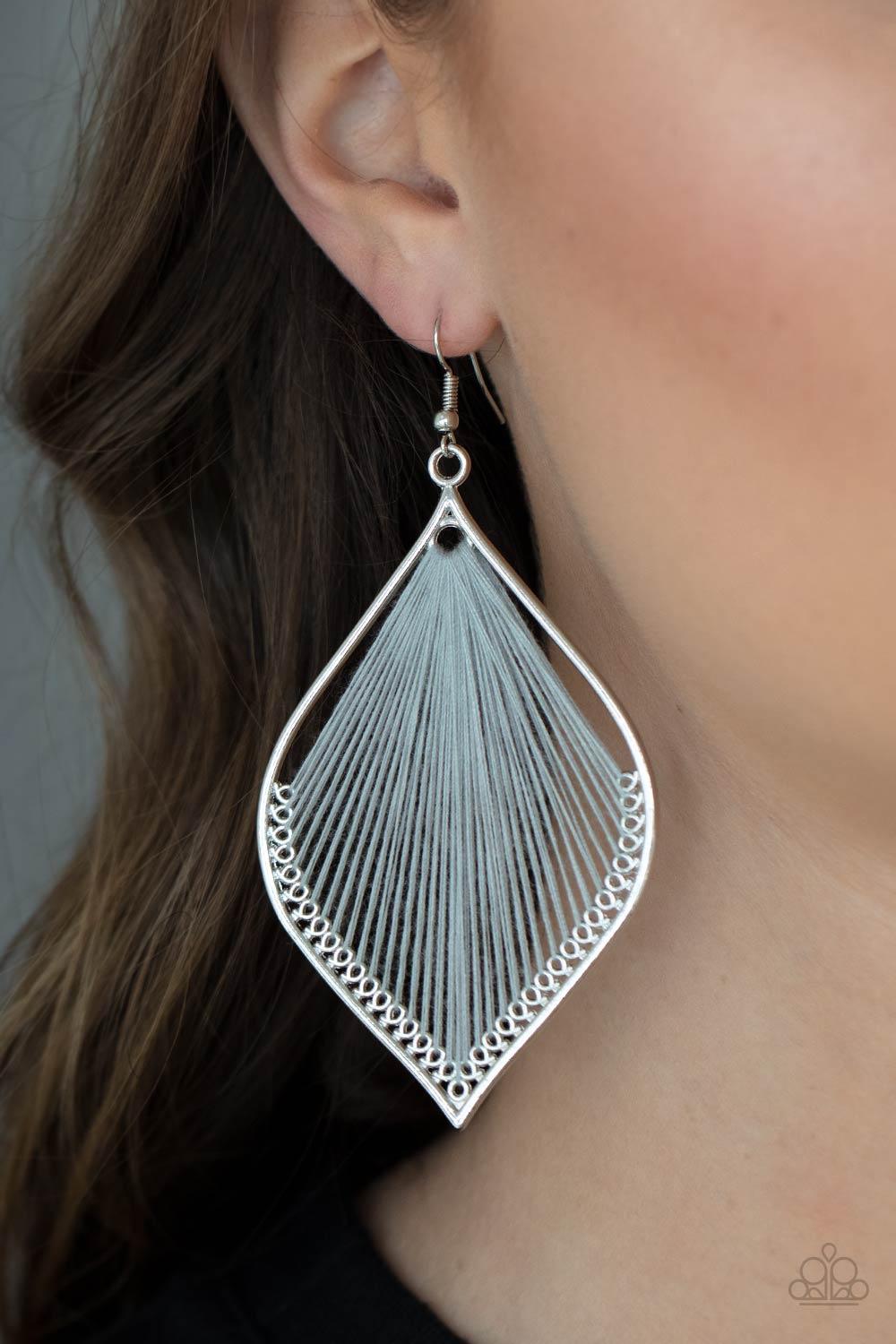 Paparazzi Accessories String Theory - Silver Ultimate Gray string is threaded through small hoops inside a silver mandala-shaped frame for a vibrant artistic adornment. Earring attaches to a standard fishhook fitting. Sold as one pair of earrings. Jewelry