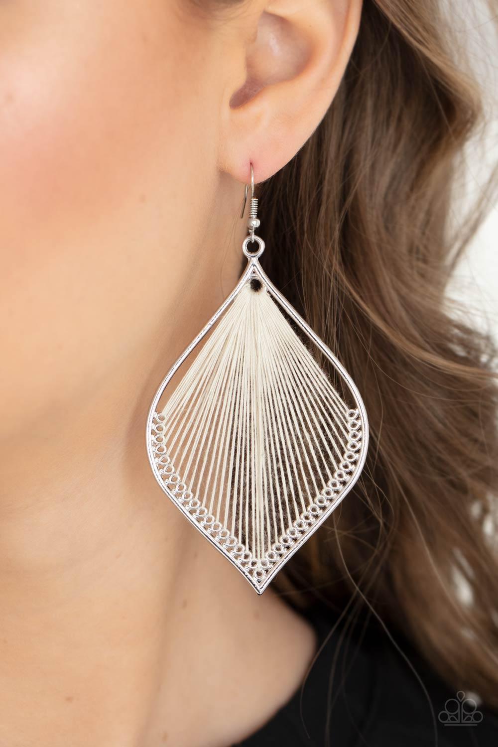 Paparazzi Accessories String Theory - White White string is threaded through small hoops inside a silver mandala-shaped frame for a vibrant artistic adornment. Earring attaches to a standard fishhook fitting. Sold as one pair of earrings. Jewelry