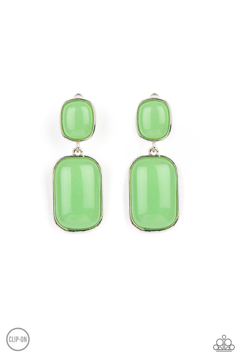 Paparazzi Accessories Meet Me At The Plaza - Green Encased in sleek silver frames, milky Green Ash beads link into an oversized lure for a whimsically refined flair. Earring attaches to a standard clip-on fitting. Sold as one pair of clip-on earrings. Ear