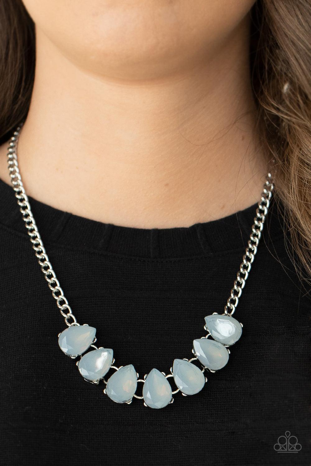 Paparazzi Accessories Above The Clouds - Silver A row of heavenly cloudy teardrop gems, set in pronged settings, line up across the collar in angelic ambiance. Features an adjustable clasp closure. Sold as one individual necklace. Includes one pair of mat