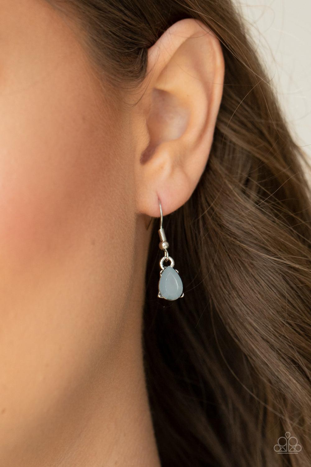 Paparazzi Accessories Above The Clouds - Silver A row of heavenly cloudy teardrop gems, set in pronged settings, line up across the collar in angelic ambiance. Features an adjustable clasp closure. Sold as one individual necklace. Includes one pair of mat