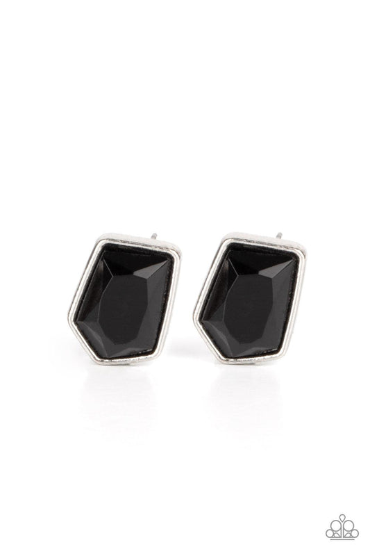 Paparazzi Accessories Indulge Me - Black Featuring a raw asymmetrical cut, a glittery black gem is encased inside a sleek silver frame, creating an edgy display. Earring attaches to a standard post fitting. Sold as one pair of post earrings. Jewelry