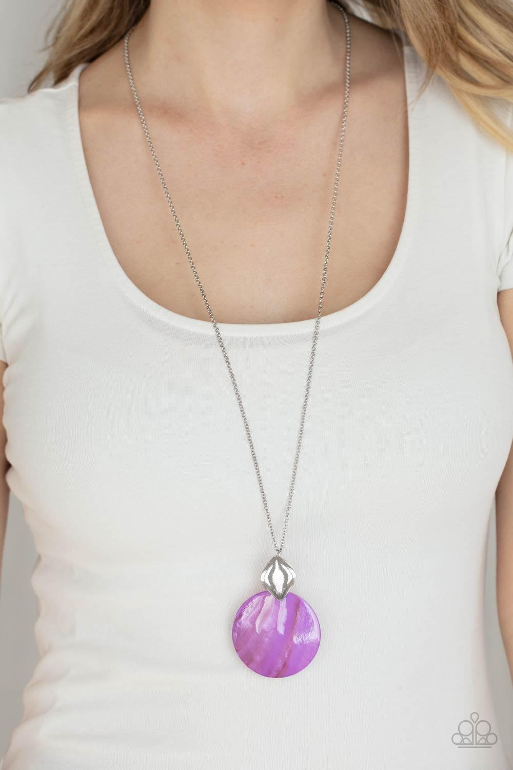 Paparazzi Accessories Tidal Tease - Purple Featuring a glistening iridescence, a Lavender shell-like disc attaches to a shiny silver frame at the bottom of a lengthened silver chain, creating a summery pendant. Features an adjustable clasp closure. Sold a