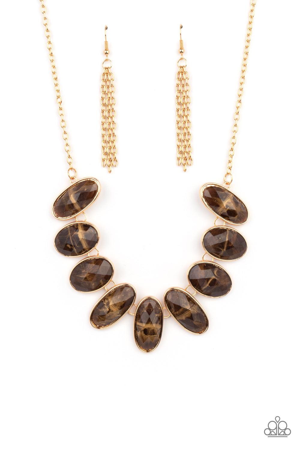 Paparazzi Accessories Elliptical Episode - Brown Generous glossy brown gems, dusted in shimmery gold, lay in oval gold frames and link across the collar creating a glimmering statement. Features an adjustable clasp closure. Sold as one individual necklace