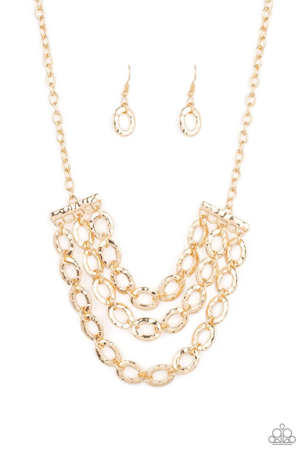 Paparazzi Accessories Repeat After Me - Gold Three rows of gold chains with oversized hammered oval links attach to gold bars for an edgy display below the collar. Features an adjustable clasp closure. Sold as one individual necklace. Includes one pair of