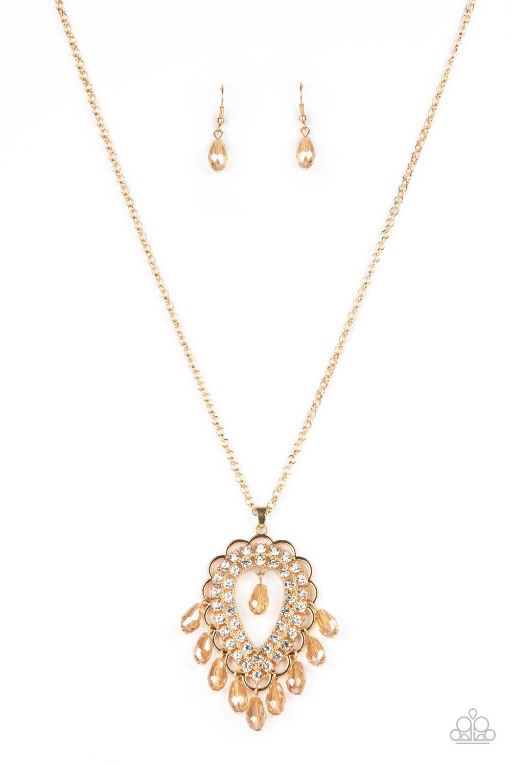 Paparazzi Accessories Teasable Teardrops - Gold An oversized scalloped teardrop frame, tipped on its point, encases rows of sparkling white rhinestones in its lustrous gold fittings. Shimmery faceted champagne teardrop beads dangle daintily from the scall