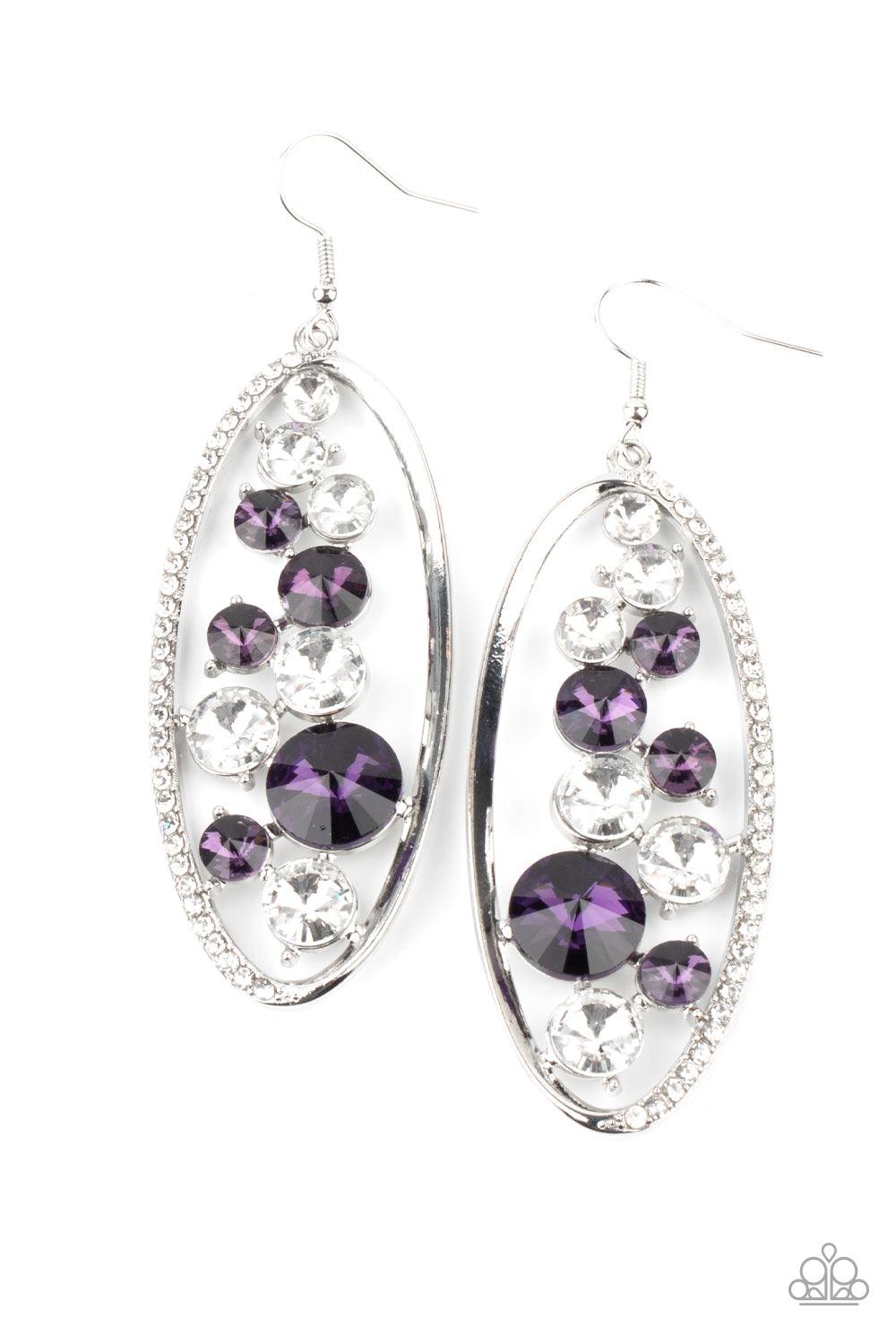 Paparazzi Accessories Rock Candy Bubbly - Purple An oversized collection of glassy white and glittery purple rhinestones sparkle inside a silver oval frame. One side of the frame is encrusted in dainty white rhinestones, adding a refined flair to the bubb