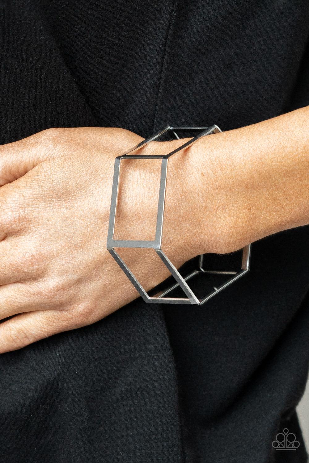 Paparazzi Accessories Gen HEX - Silver A row of airy silver rectangular frames delicately bend into a hexagonal cuff, creating an edgy centerpiece. Sold as one individual bracelet. Jewelry