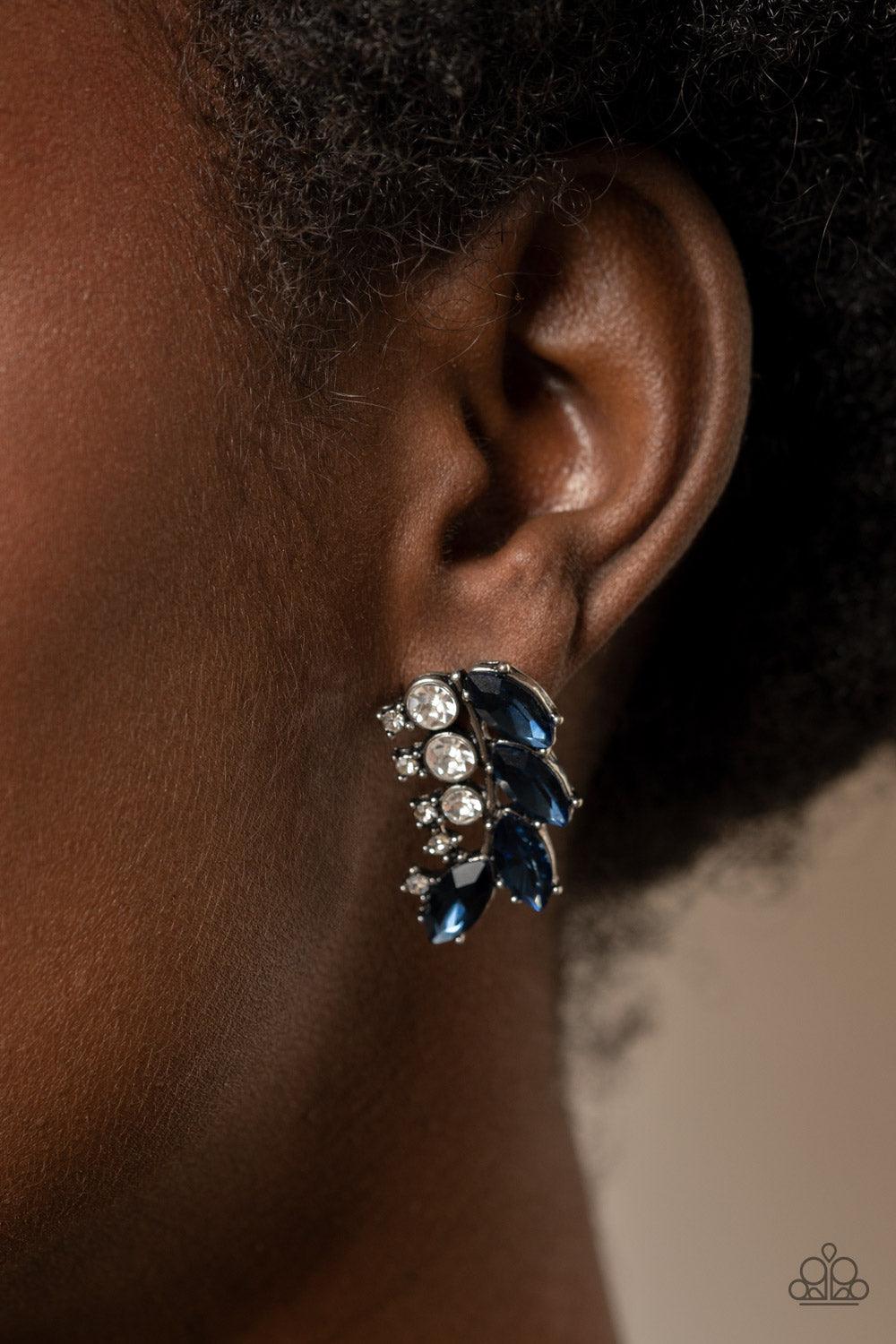 Paparazzi Accessories Flawless Fronds - Blue A frond of dazzling blue marquise and round white rhinestones delicately curves below the ear for a flawless finish. Earring attaches to a standard post fitting. Sold as one pair of post earrings. Jewelry