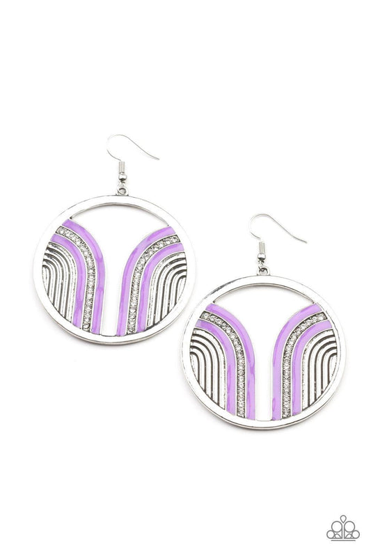 Paparazzi Accessories Delightfully Deco - Purple Infused with a glittery row of white rhinestones, shiny purple arcs curve into juxtaposed frames inside a classic silver hoop, creating a colorful art deco inspired centerpiece. Earring attaches to a standa