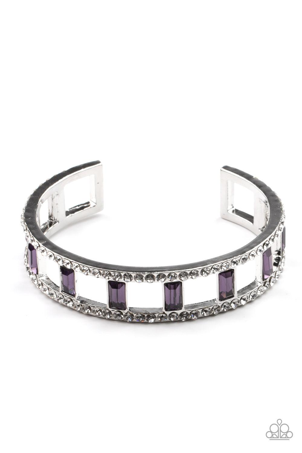 Paparazzi Accessories Industrial Icing - Purple Bands of glittery white rhinestones overlaid on silver frames create an airy channel-like framework. Elegant baguette style cut purple gems, connected to the glittery framework, circle around the wrist for a