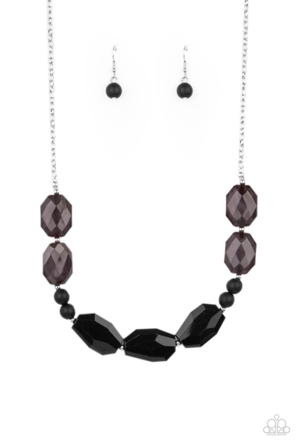 Paparazzi Accessories Melrose Melody - Black A series of opaque and faceted black gem-like beads are threaded along an invisible wire. Dainty silver beads add shining accents as they traverse across the collar on a silver chain in a classically melodic di